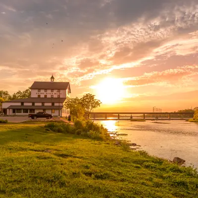 Caledonia Old Mill and Train bridge with sunset behind