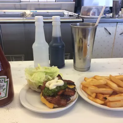 A diner meal of shake burger and fries