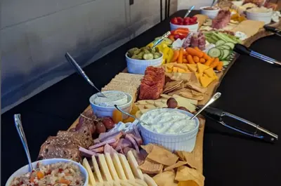 Six foot feasting board piled high with meats, cheeses and festive goodies