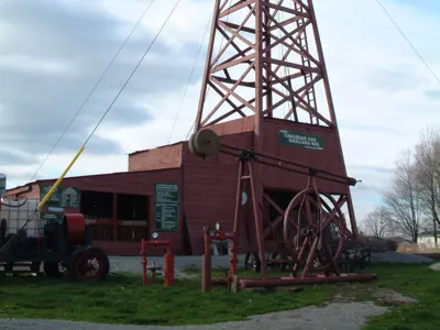 A large drilling rig with buildings