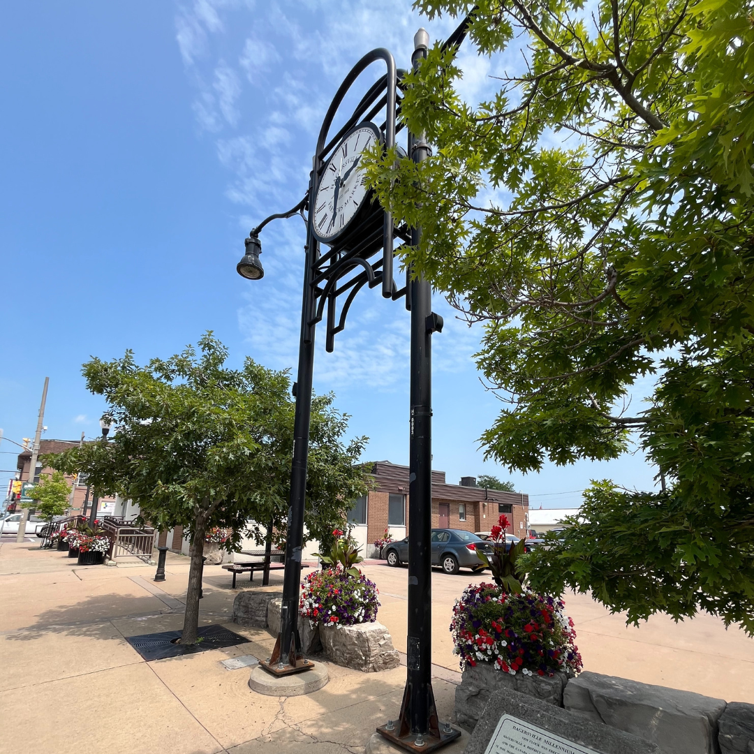 millenium clock tower in front of parking lot