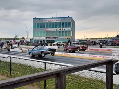 two cars racing on a track