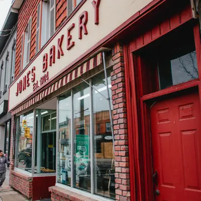 2 people shopping outside jones bakery