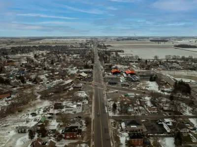 An aerial picture of a small town in the winter