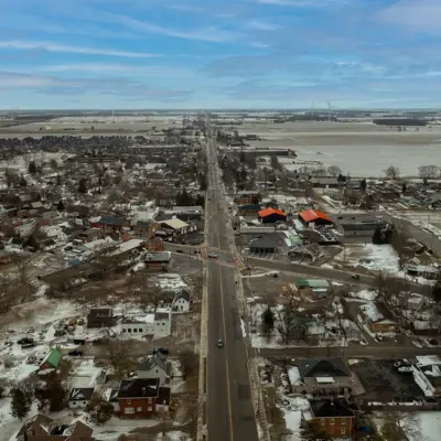 An aerial picture of a small town in the winter